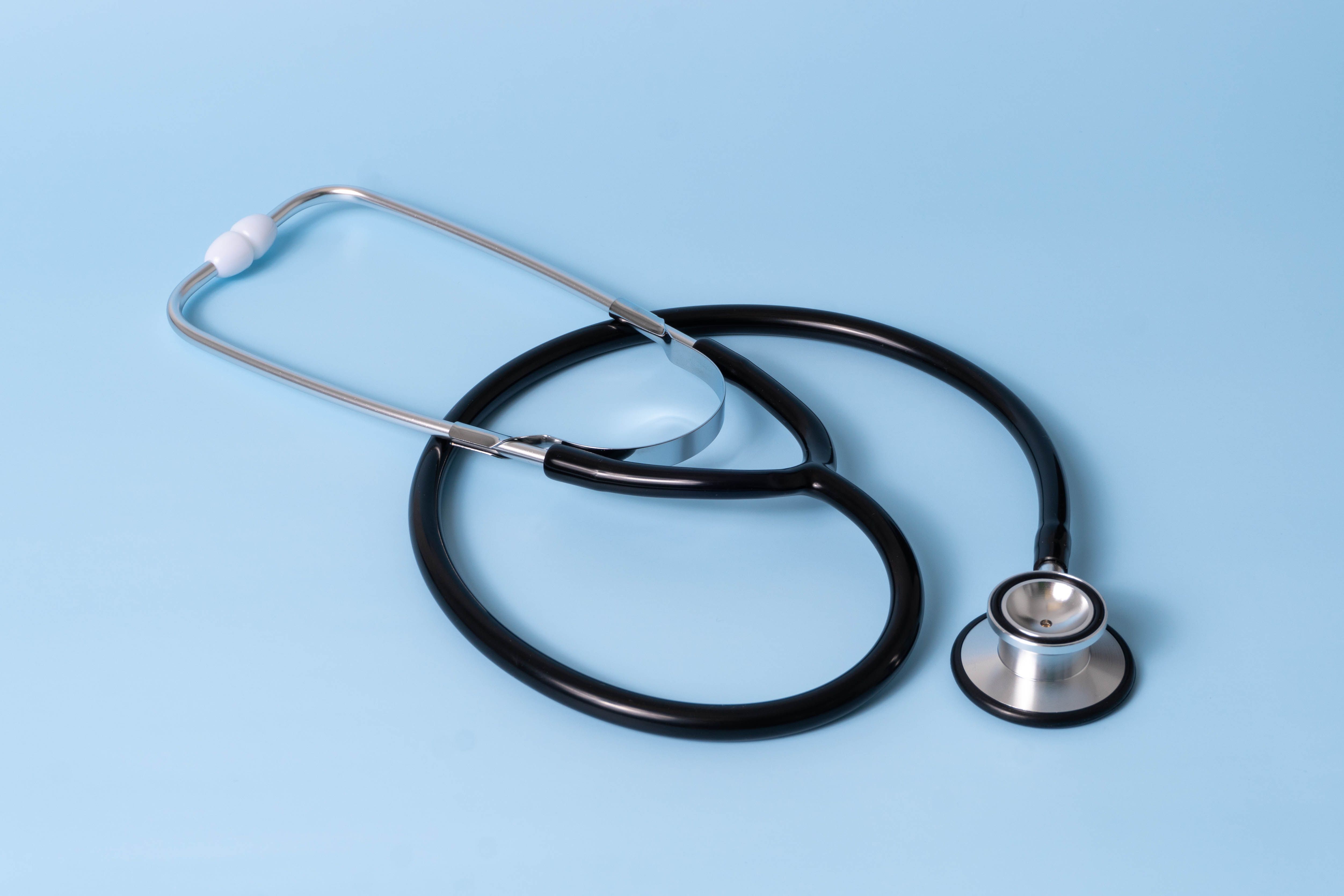 Stethoscope on a light blue background