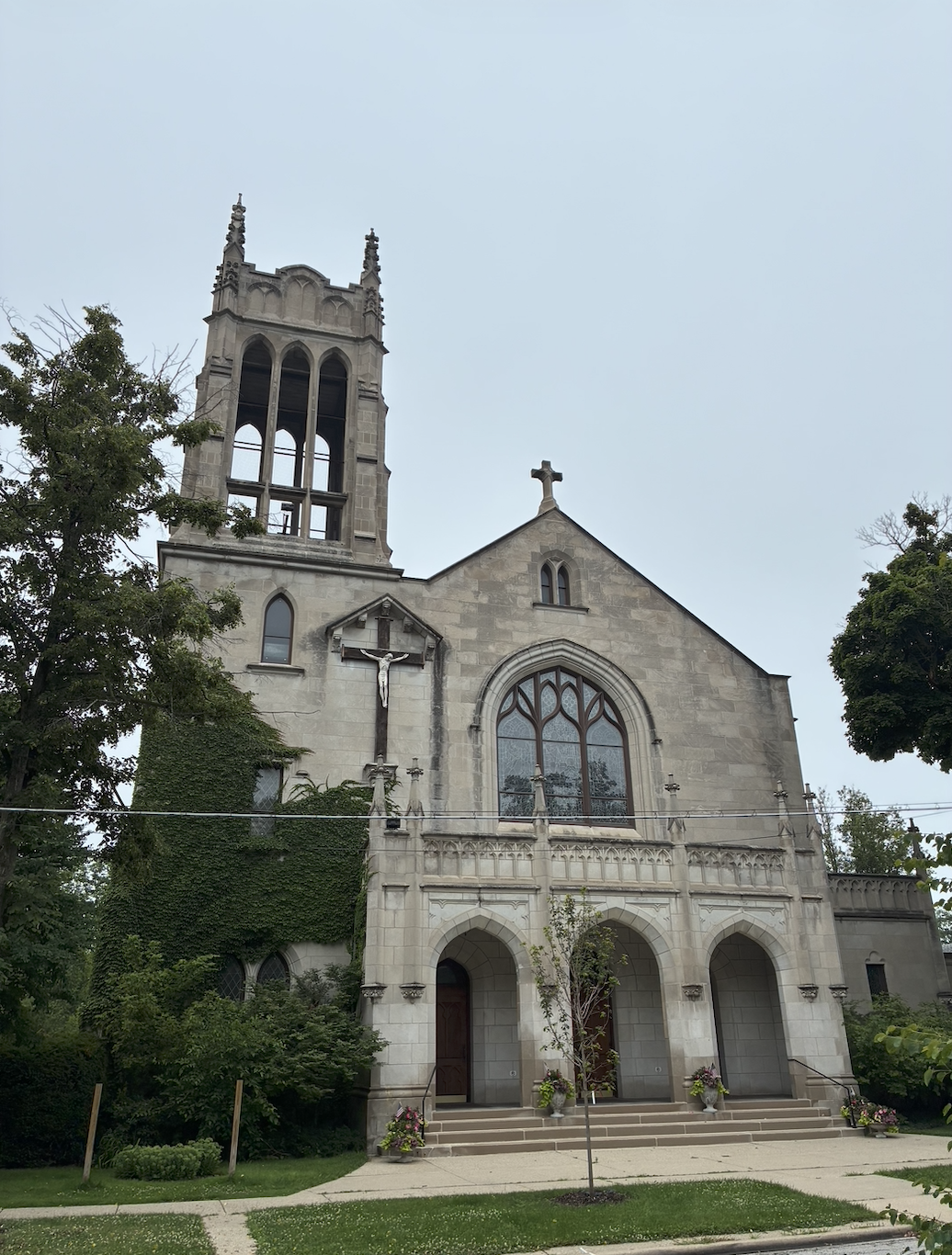 Small white rural church with steeple